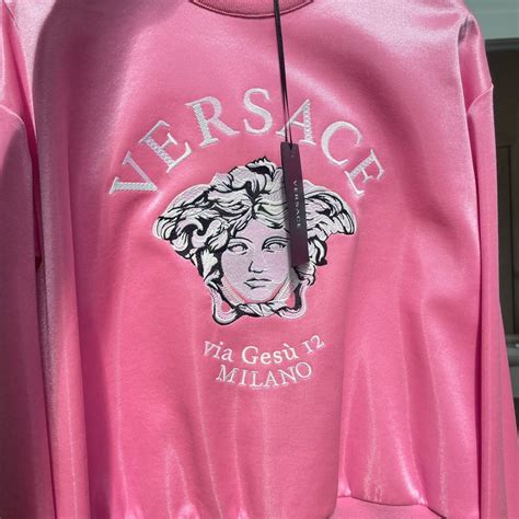 pink Versace sweater